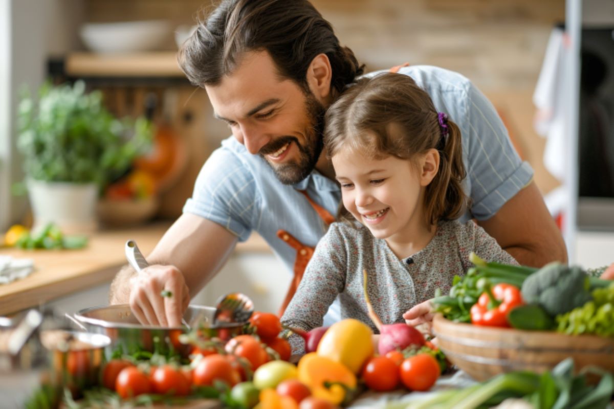 This shows a father and daughter making a meal.